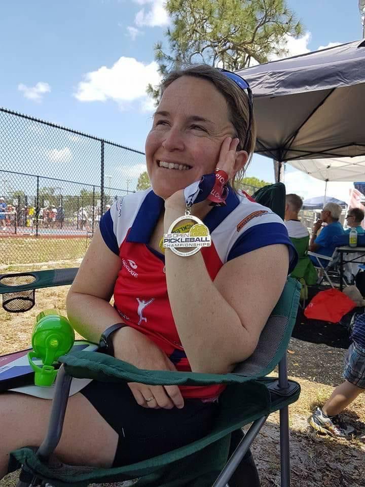 Sheena Maclean-Bell, founder of All 4 Pickleball, smiling with a UK Open Pickleball Championships medal